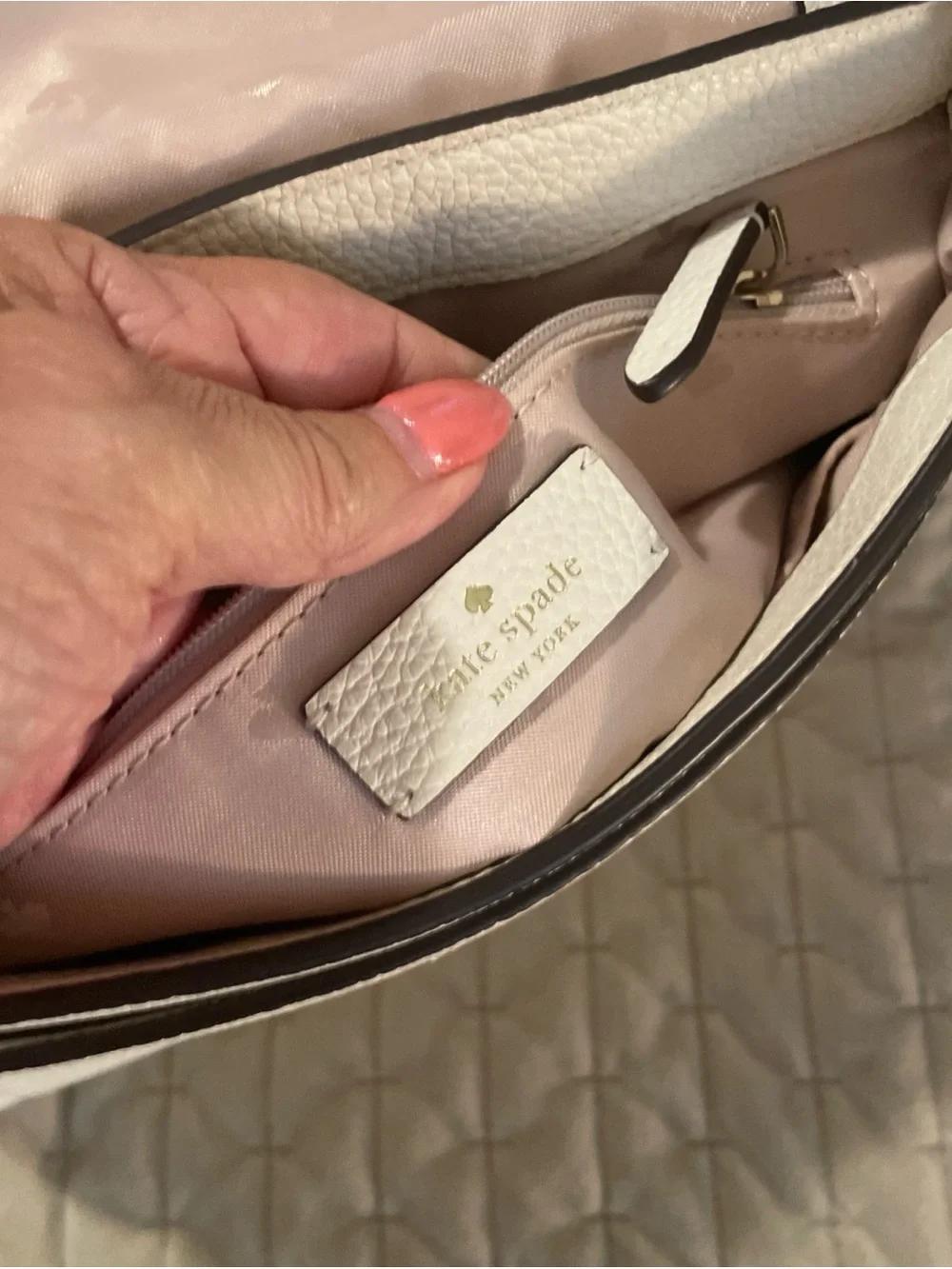 kate spade cream pebbled leather crossbody with gold logo